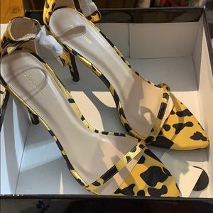 Yellow and black pumps